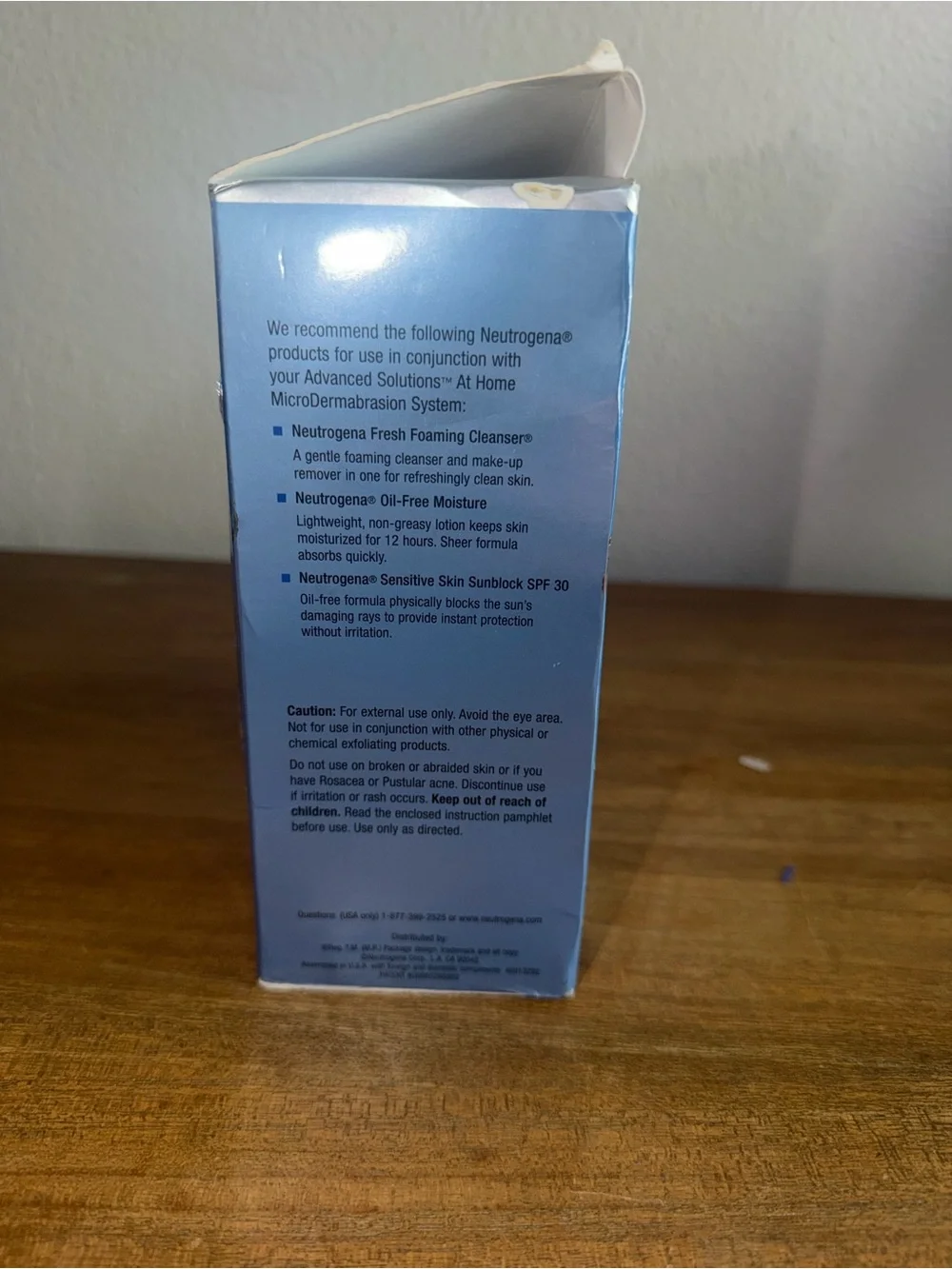 Neutrogena White Microdermabrasion At-Home Device with Blue Packaging